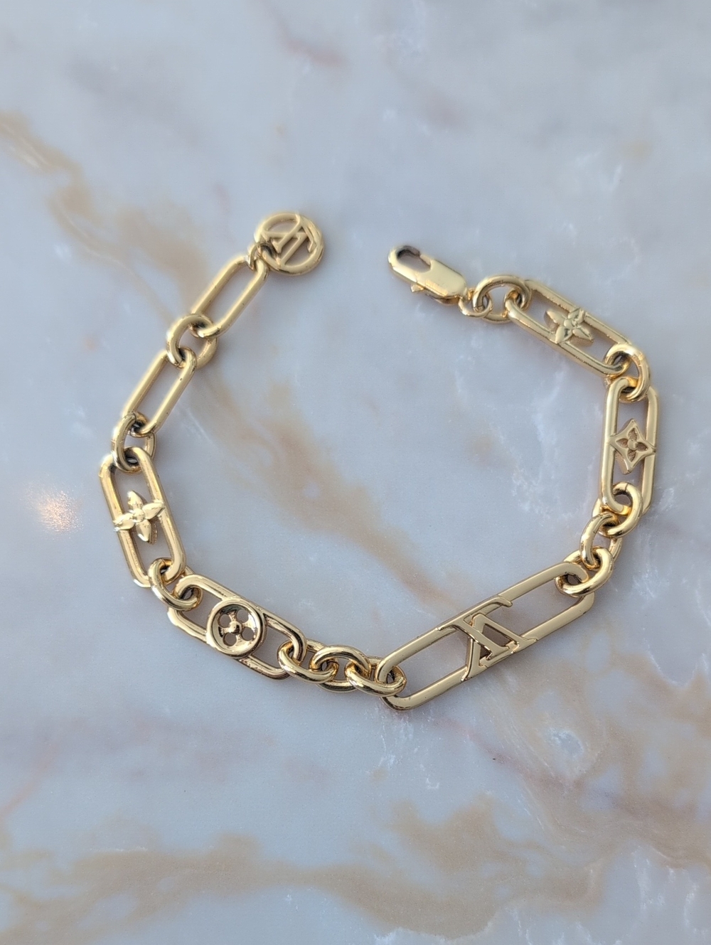 Louis Vuitton Gold Link Logo Charm Bracelet - Luxury Designer